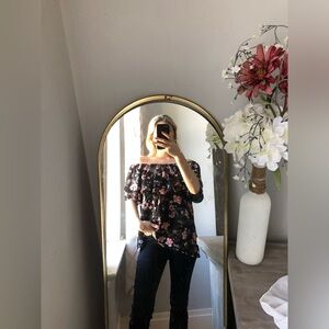 Black ruffle off the shoulder top with pink floral design